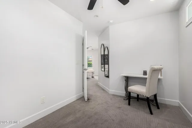a view of a room with table and chair