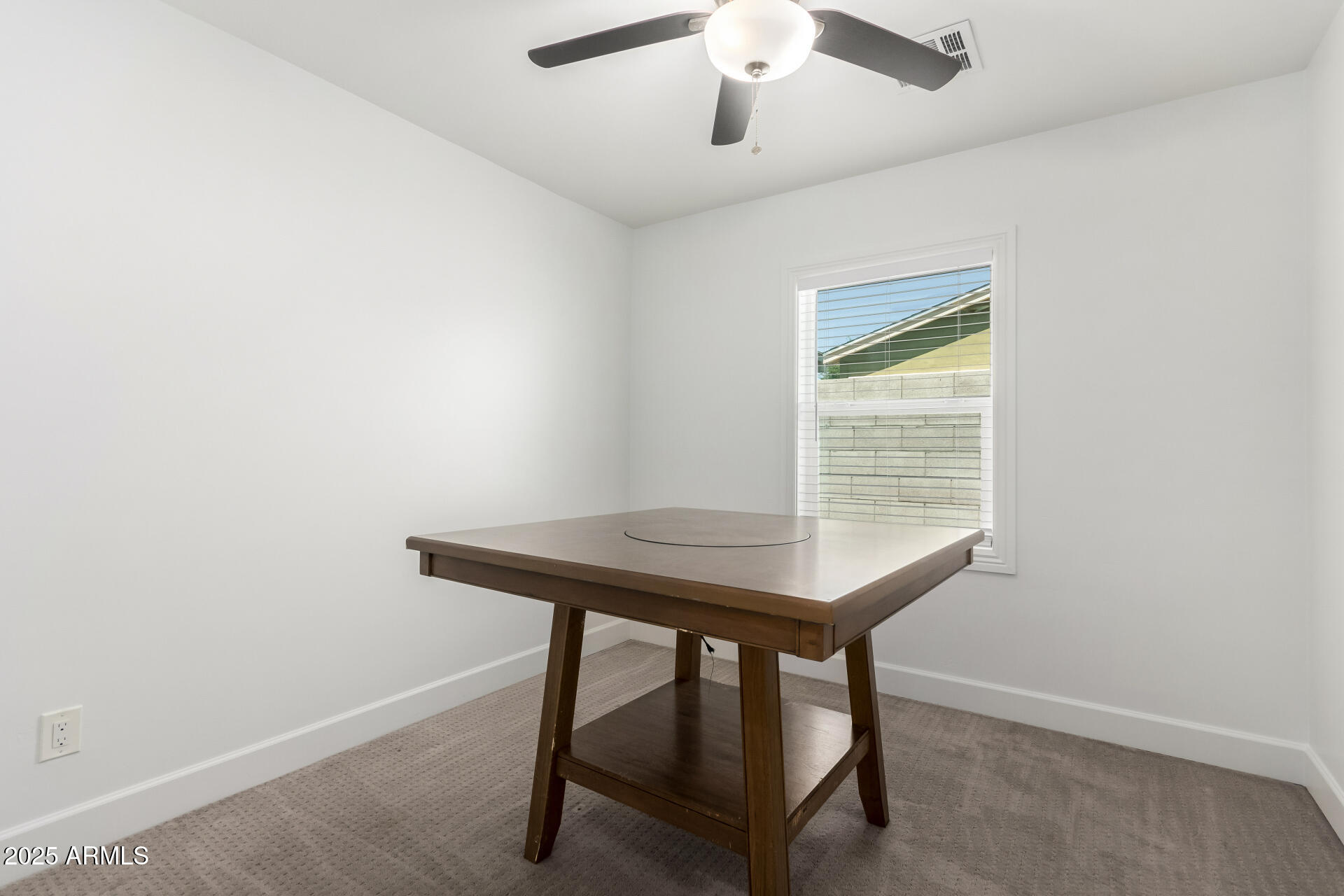 6741 North 10th Street Phoenix, AZ 85014 - Photo 26 of 37 a view of a workspace with furniture and a window
