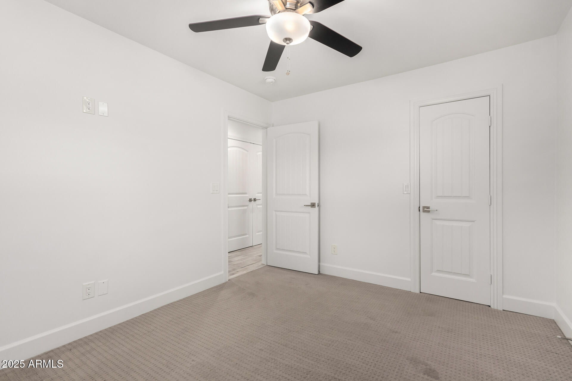 6741 North 10th Street Phoenix, AZ 85014 - Photo 28 of 37 a view of a big room with chandelier fan