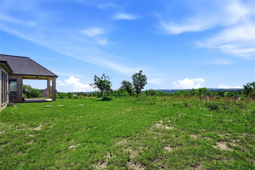 4021 West J E Woody Road Springtown, TX 76082 - Photo 37 of 37 One must come out to enjoy the back panoramic view