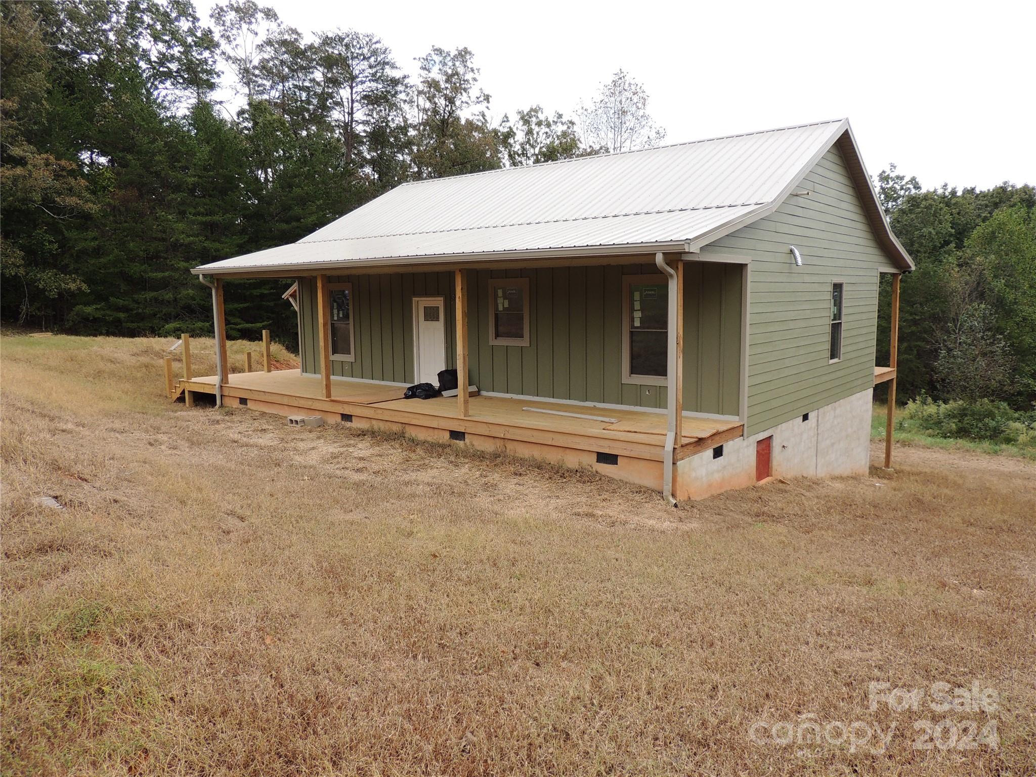119 Sasafras Ridge Rutherfordton, NC 28139 - Photo 3 of 36 a view of a house with backyard and porch