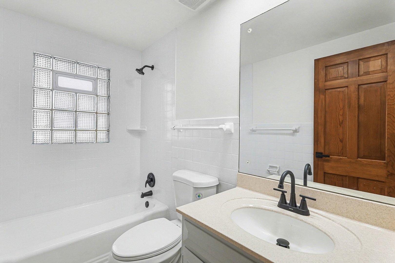 33 South Canterbury Road Aurora, IL 60506 - Photo 15 of 28 a bathroom with a sink toilet and shower