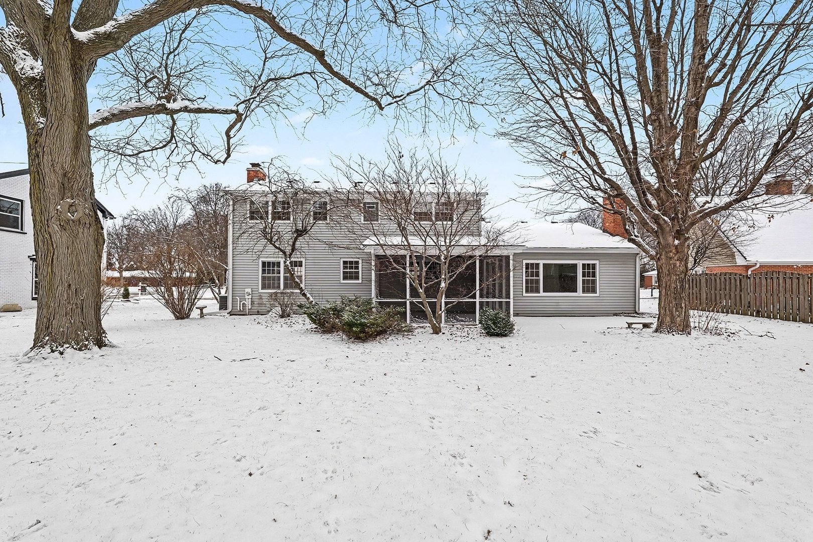 33 South Canterbury Road Aurora, IL 60506 - Photo 24 of 28 a view of a house with a snow in the yard