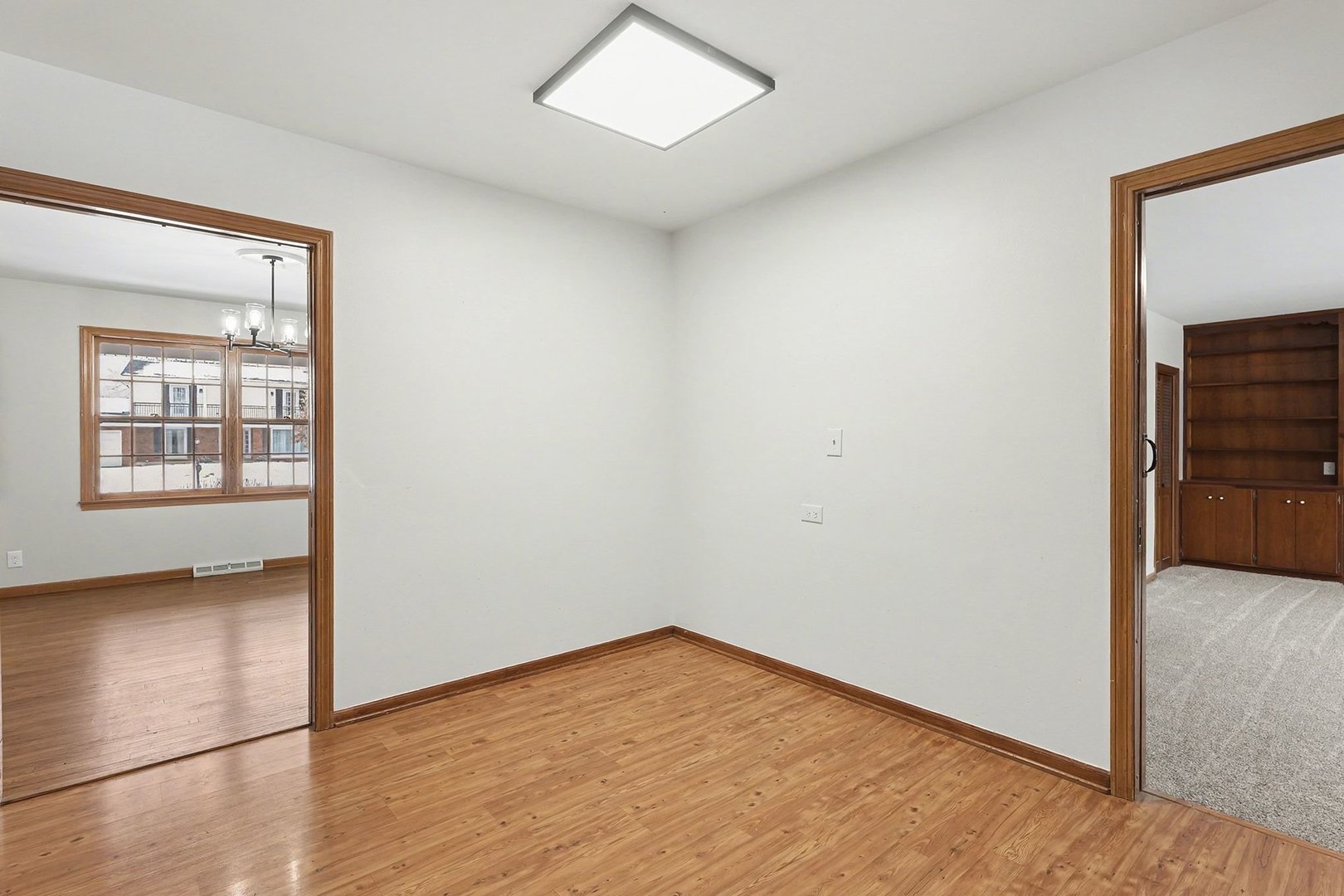 33 South Canterbury Road Aurora, IL 60506 - Photo 8 of 28 an empty room with windows