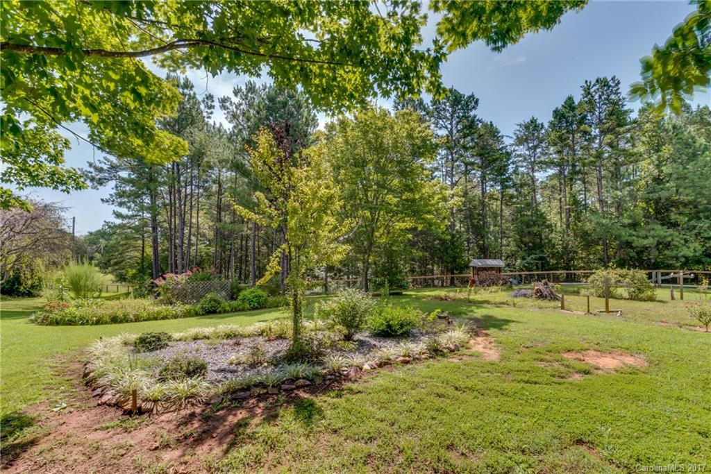 2437 Maple Creek Road Rutherfordton, NC 28139 - Photo 2 of 24 a view of a park with large trees