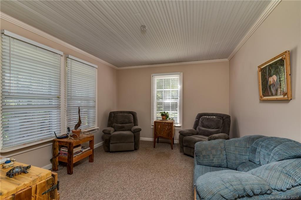 2437 Maple Creek Road Rutherfordton, NC 28139 - Photo 15 of 24 a living room with furniture a couch and a window