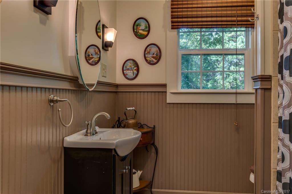 2437 Maple Creek Road Rutherfordton, NC 28139 - Photo 18 of 24 a bathroom with a sink and a mirror