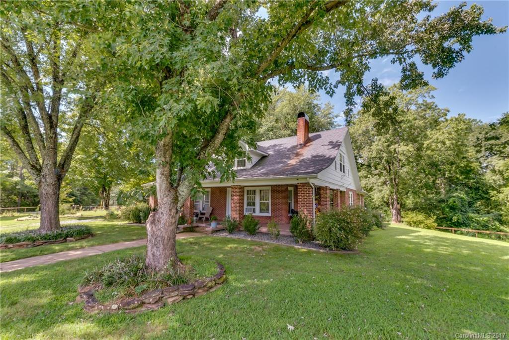 2437 Maple Creek Road Rutherfordton, NC 28139 - Photo 3 of 24 a view of house with a big yard plants and large trees