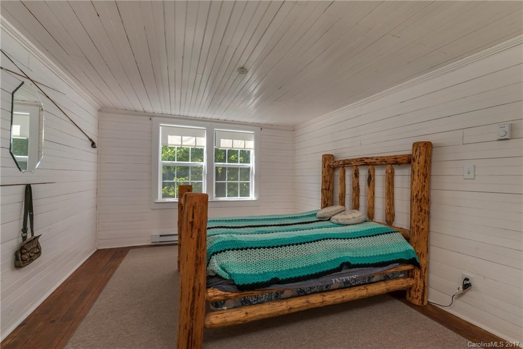 2437 Maple Creek Road Rutherfordton, NC 28139 - Photo 23 of 24 a bedroom with a bed and a window