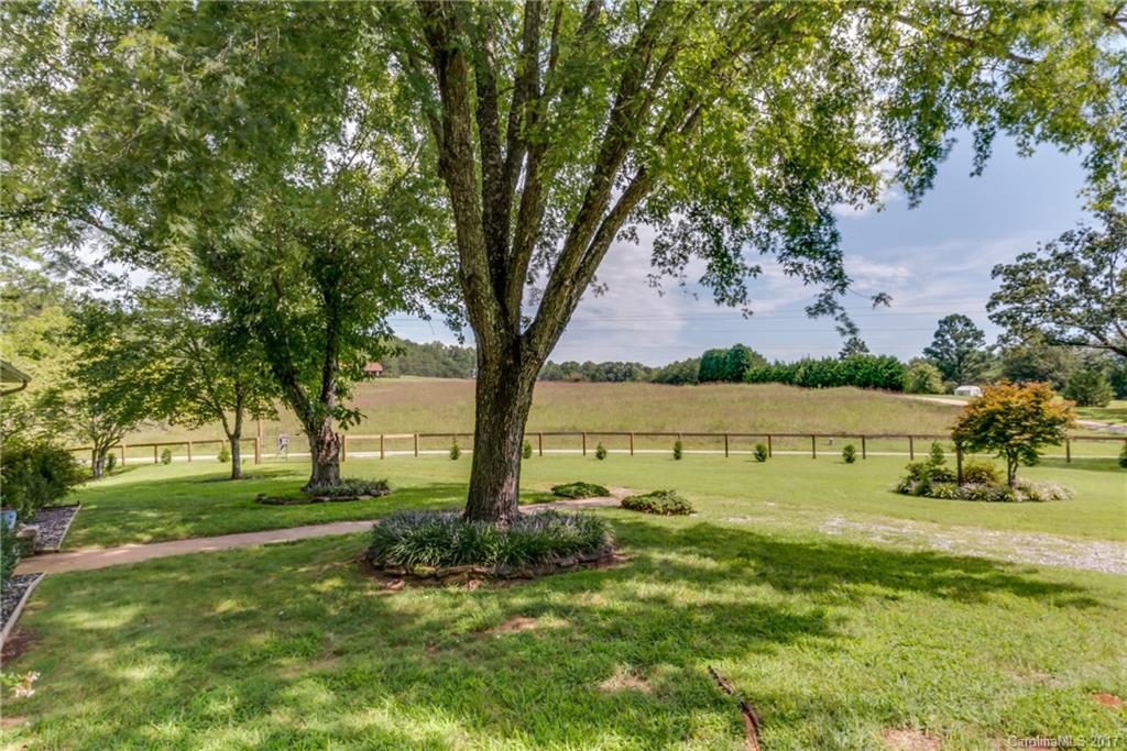 2437 Maple Creek Road Rutherfordton, NC 28139 - Photo 5 of 24 a view of lake with houses