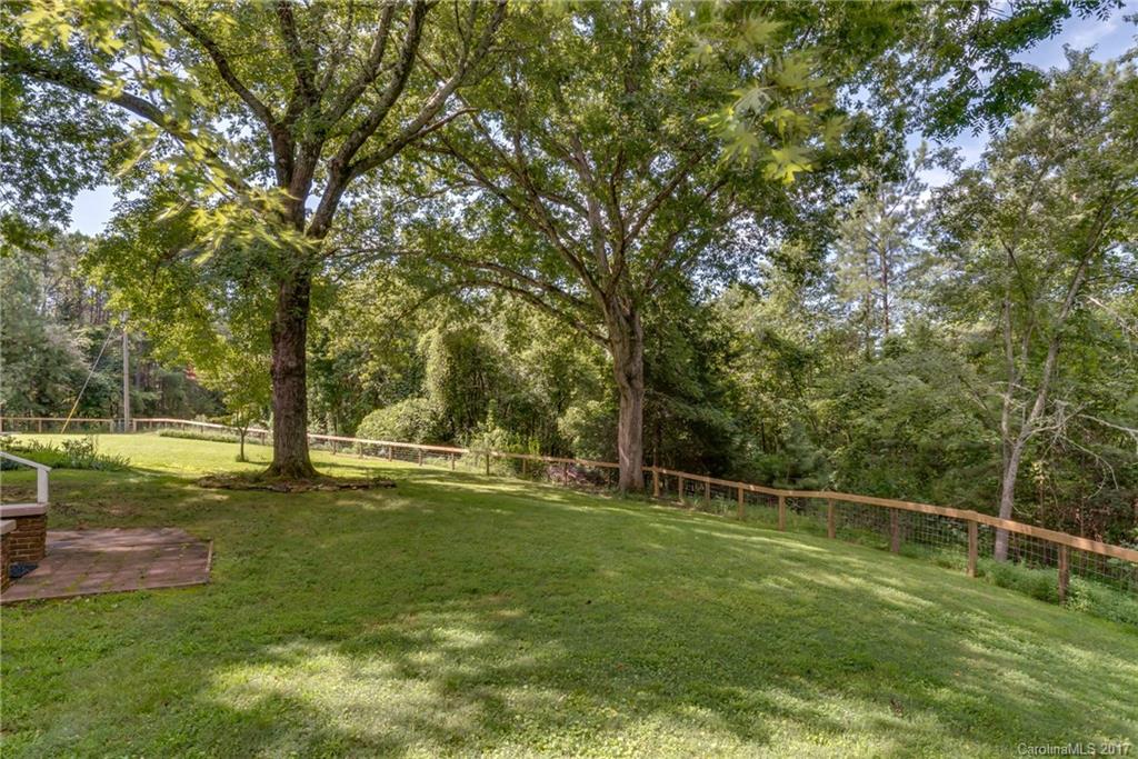 2437 Maple Creek Road Rutherfordton, NC 28139 - Photo 8 of 24 a view of a field with a tree