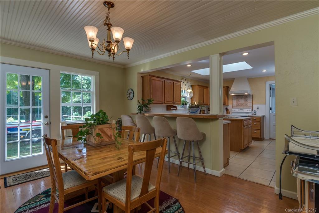 2437 Maple Creek Road Rutherfordton, NC 28139 - Photo 10 of 24 a view of a dining room with furniture window and outside view