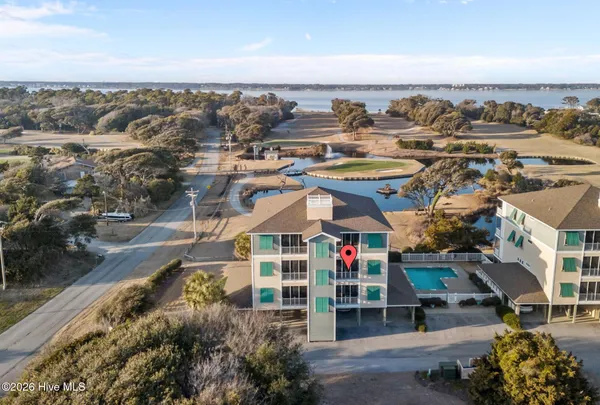 $590,000 | 112 Oakleaf Drive, Unit 1002A, Pine Knoll Shores, NC 28512