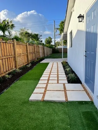 a view of a garden with pathway