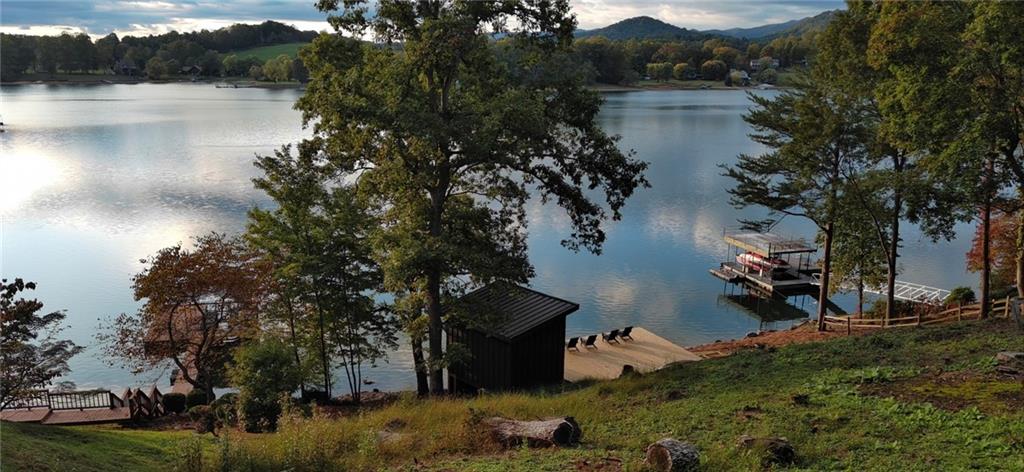 Lot 3 Lake Breeze Acres Other-north Carolina Nc 28904 Hayesville, NC 28904 - Photo 14 of 25 a backyard of a house with lots of green space