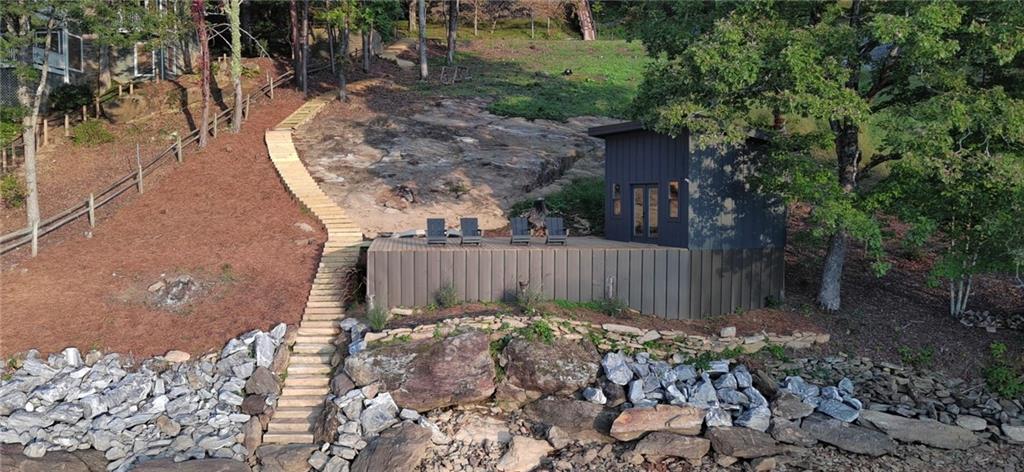 Lot 3 Lake Breeze Acres Other-north Carolina Nc 28904 Hayesville, NC 28904 - Photo 18 of 25 a view of a backyard with plants and large trees