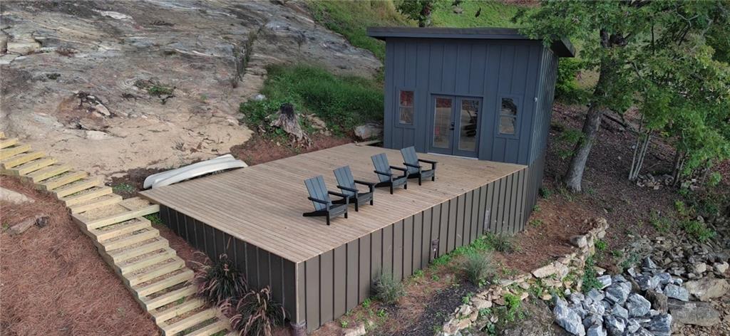 Lot 3 Lake Breeze Acres Other-north Carolina Nc 28904 Hayesville, NC 28904 - Photo 20 of 25 a view of a house with backyard and sitting area