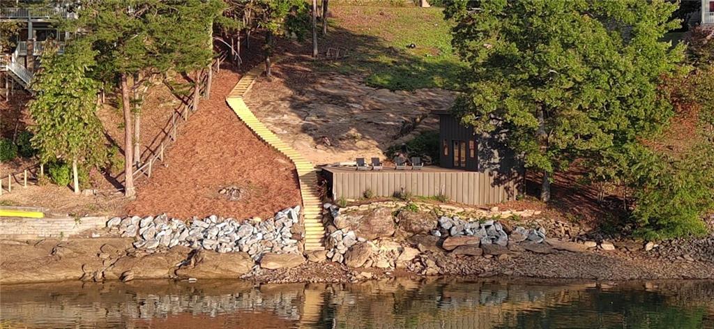 Lot 3 Lake Breeze Acres Other-north Carolina Nc 28904 Hayesville, NC 28904 - Photo 7 of 25 a view of a wooden house with a yard