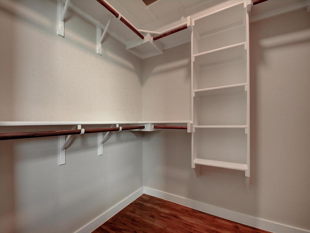 240 Rose Drive, Unit A Dripping Springs, TX 78620 - Photo 21 of 30 a view of a room with racks on the wall