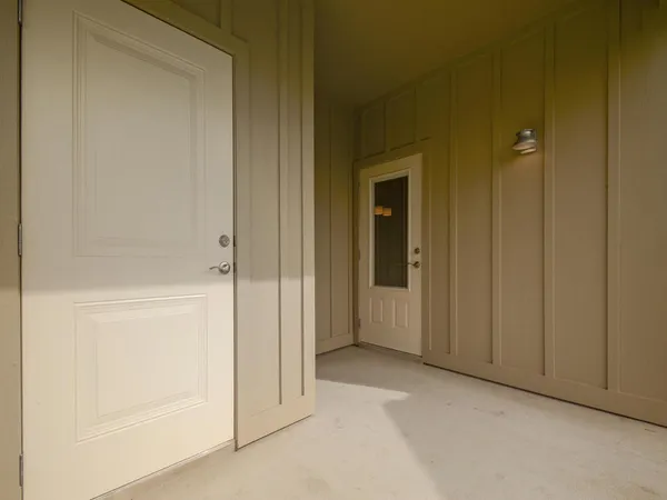 a view of a room with racks on the wall