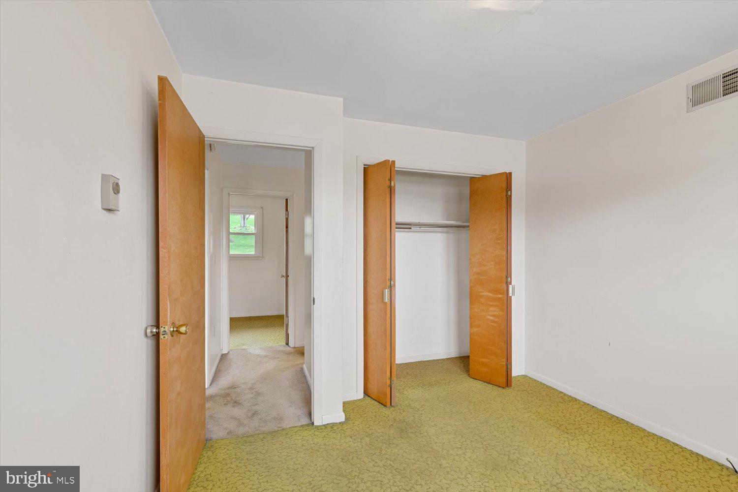 134 Bomberger Road Akron, PA 17501 - Photo 10 of 20 a view of a room with an entryway and wooden floor