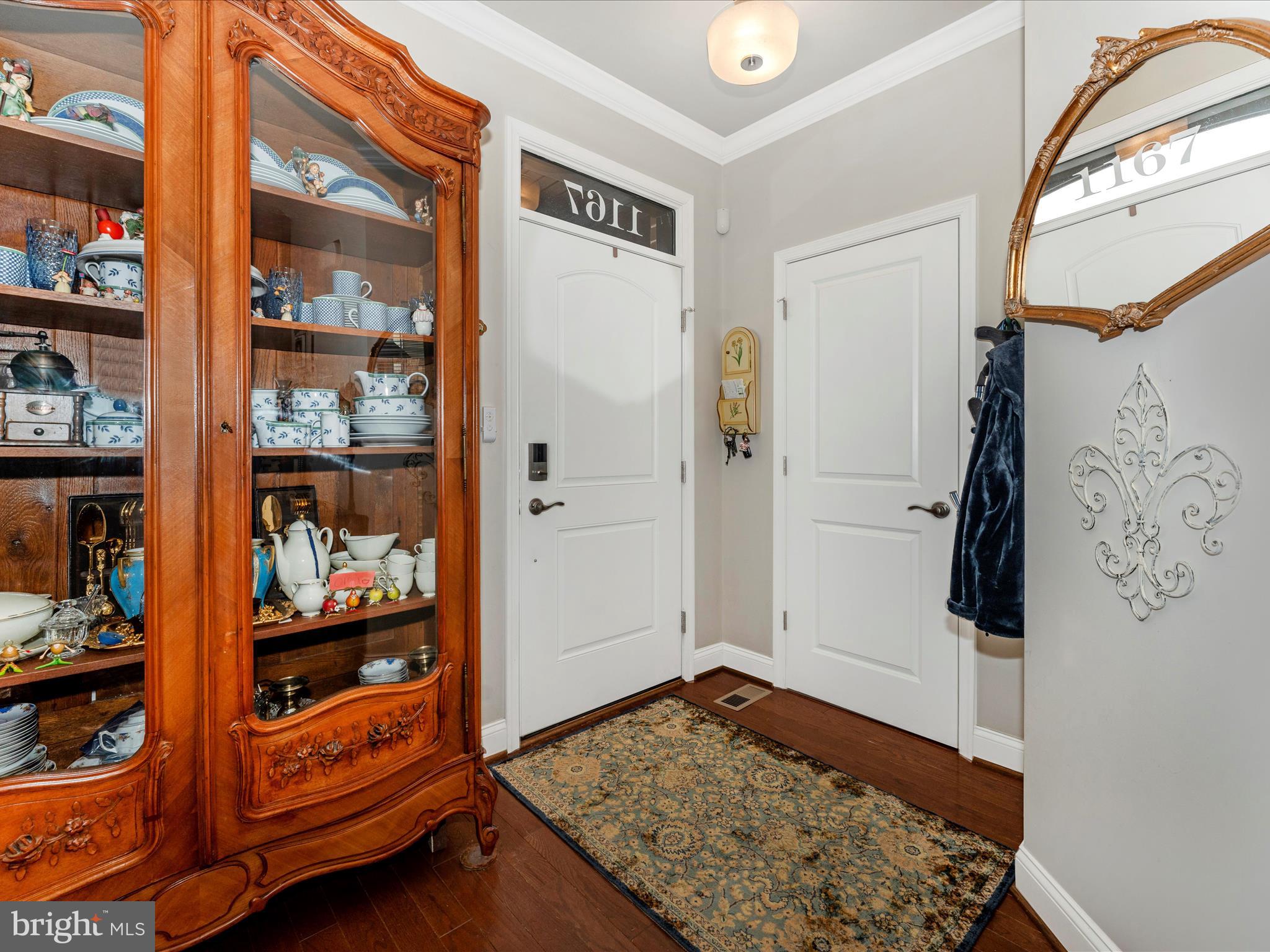 1167 Holden Road Frederick, MD 21701 - Photo 3 of 67 a view of walk in closet with clothes and shoes