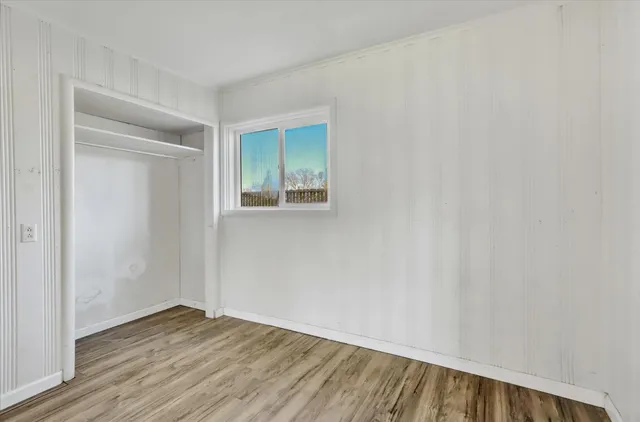 a bathroom with a toilet and a bathtub