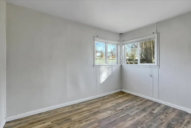 a bathroom with a sink and a window