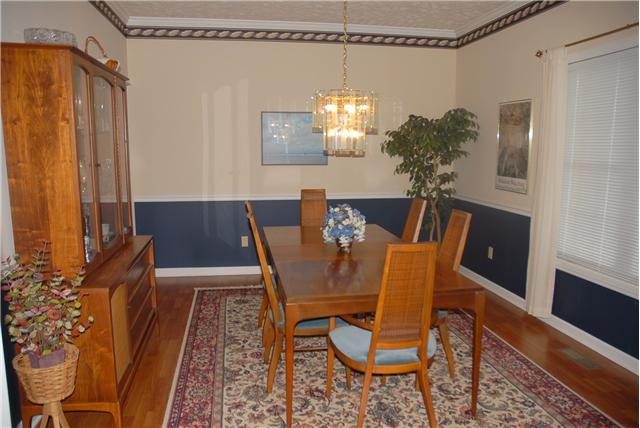 113 Hunters Ridge Drive Tullahoma, TN 37388 - Photo 3 of 14 Off of the foyer you will find the formal dining room with plenty of space for family meals.