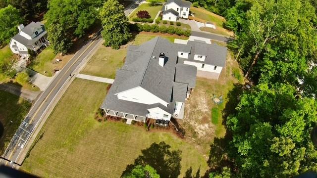 985 Whitehead Road Sugar Hill, GA 30518 - Photo 71 of 85 an aerial view of residential houses with outdoor space