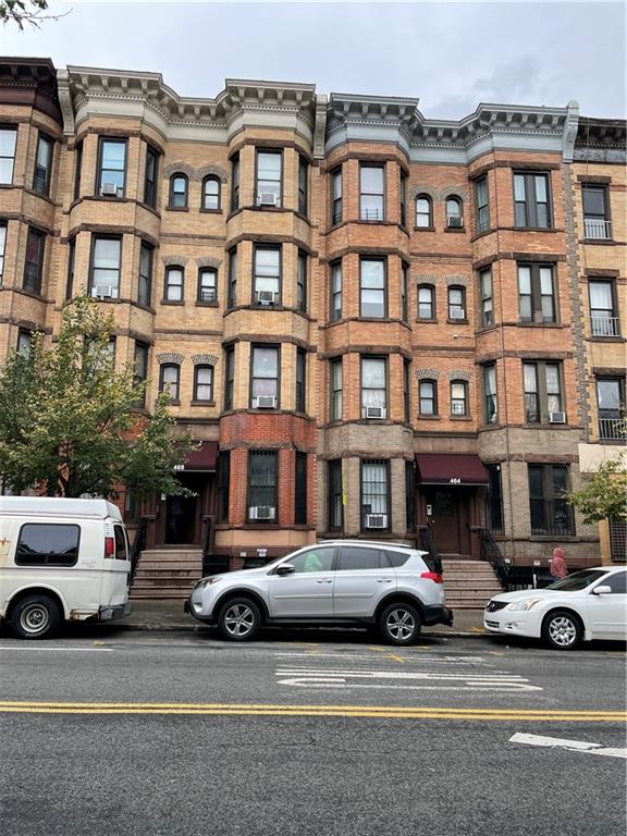 a car parked in front of a building