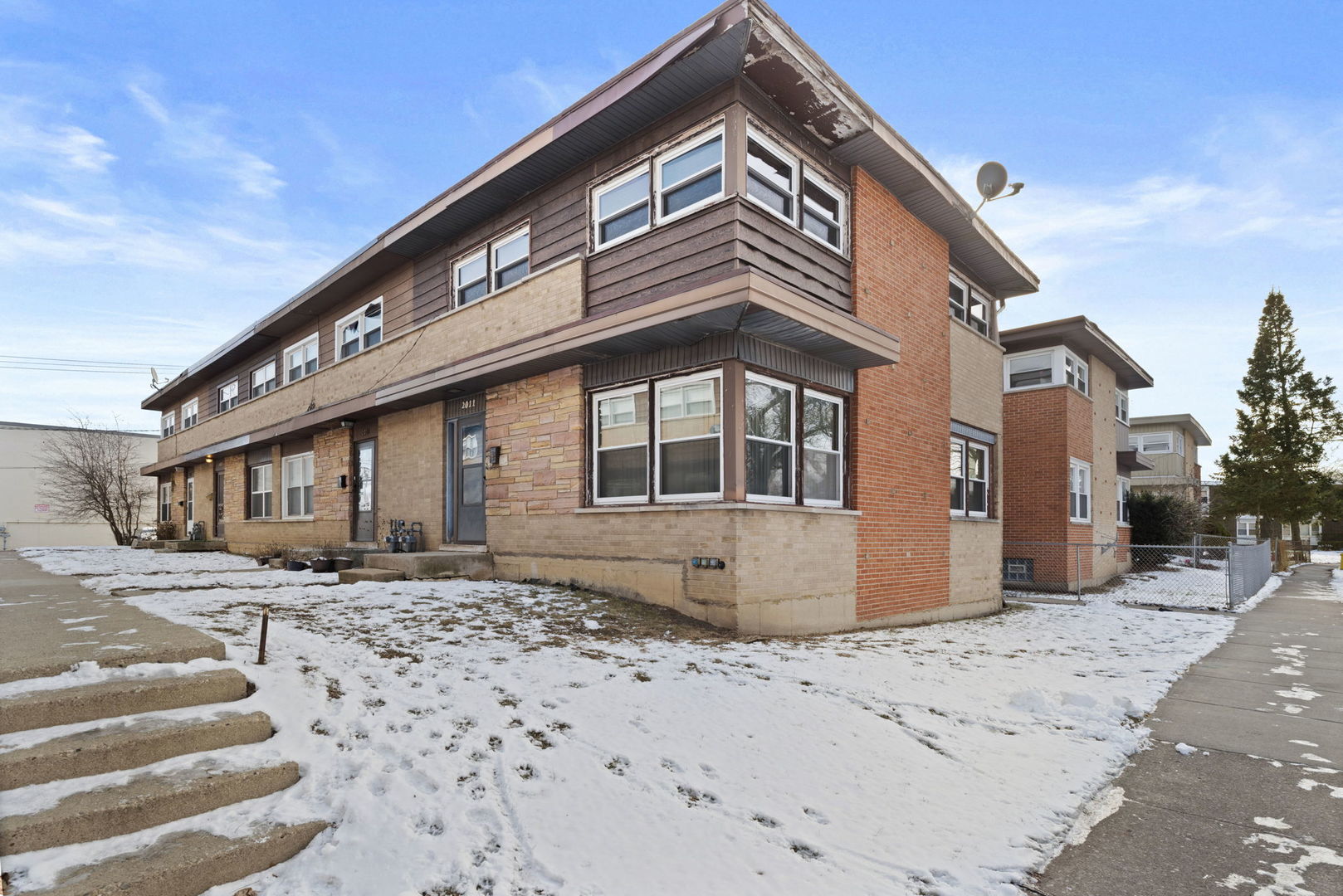 2011 Georgetown Lane Waukegan, IL 60085 - Photo 1 of 16 a front view of a house with a yard