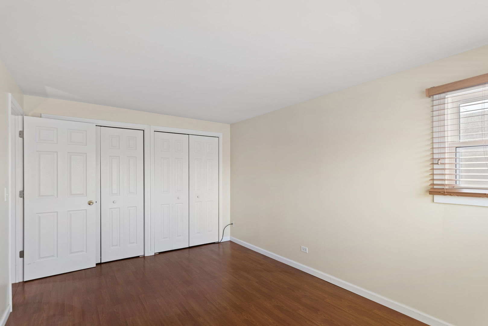 2011 Georgetown Lane Waukegan, IL 60085 - Photo 12 of 16 a view of an empty room with wooden floor