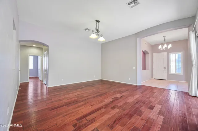 a view of livingroom with hardwood floor and ceiling fan