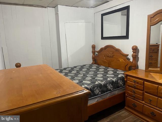 5005 Jackson Street Philadelphia, PA 19124 - Photo 6 of 11 a bedroom with a bed and a dresser