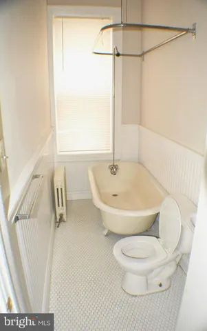 a bathroom with a sink and a shower