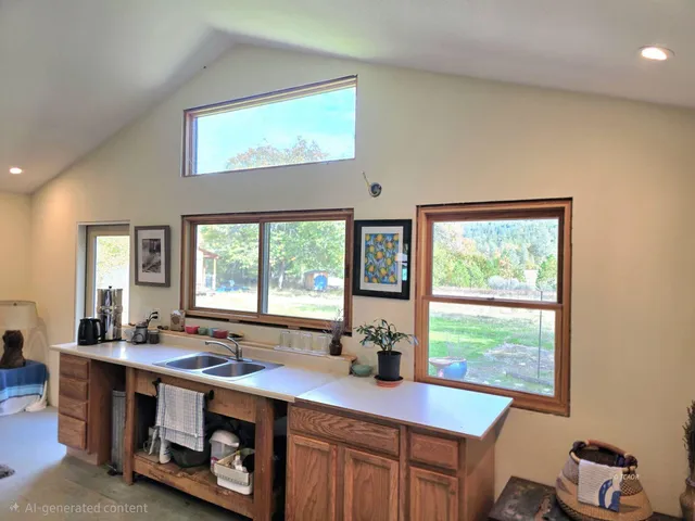 a view of room with window and sink