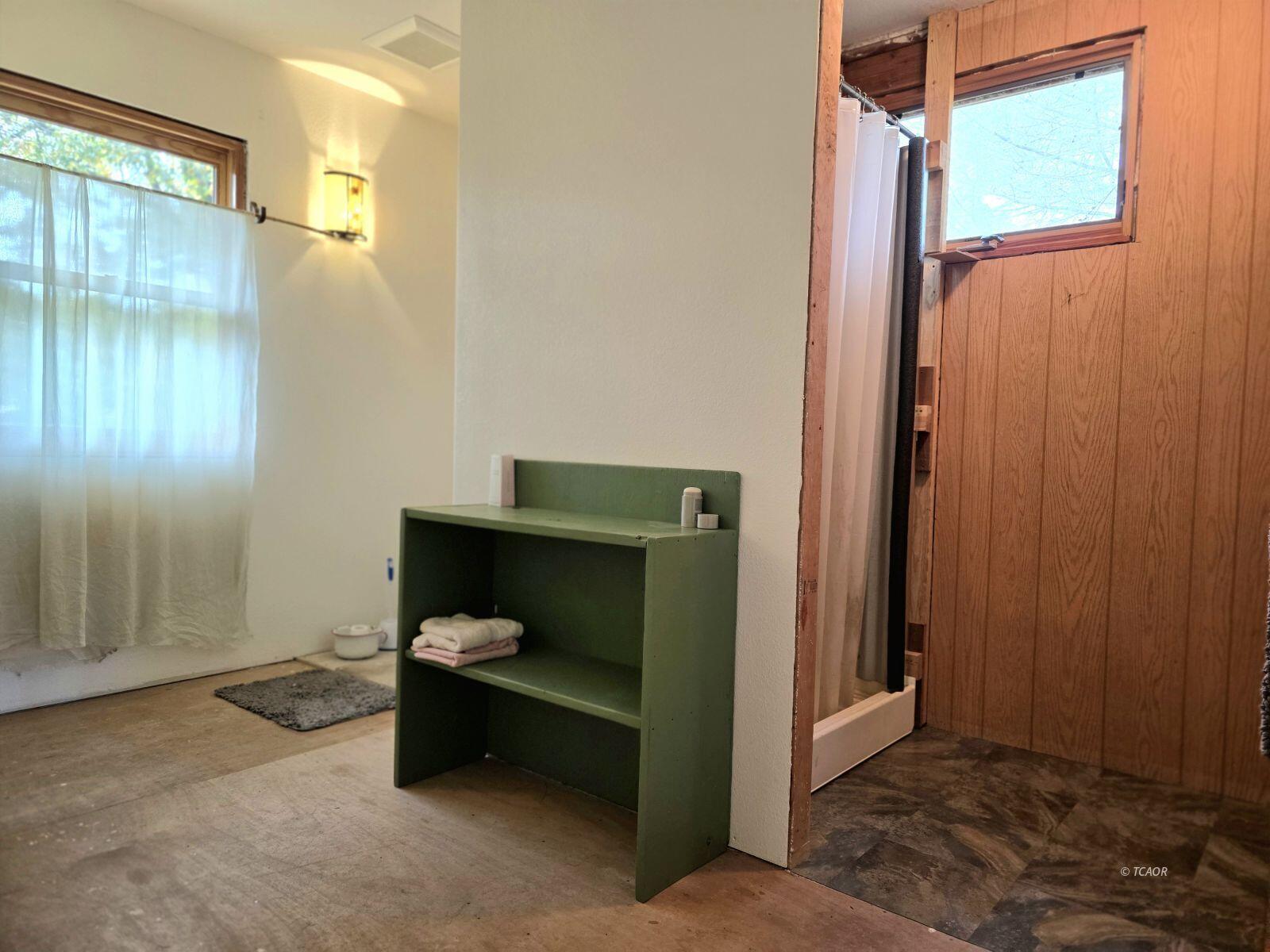 230 Corral Bottom Road Hyampom, CA 96046 - Photo 19 of 42 a living room with furniture and a window