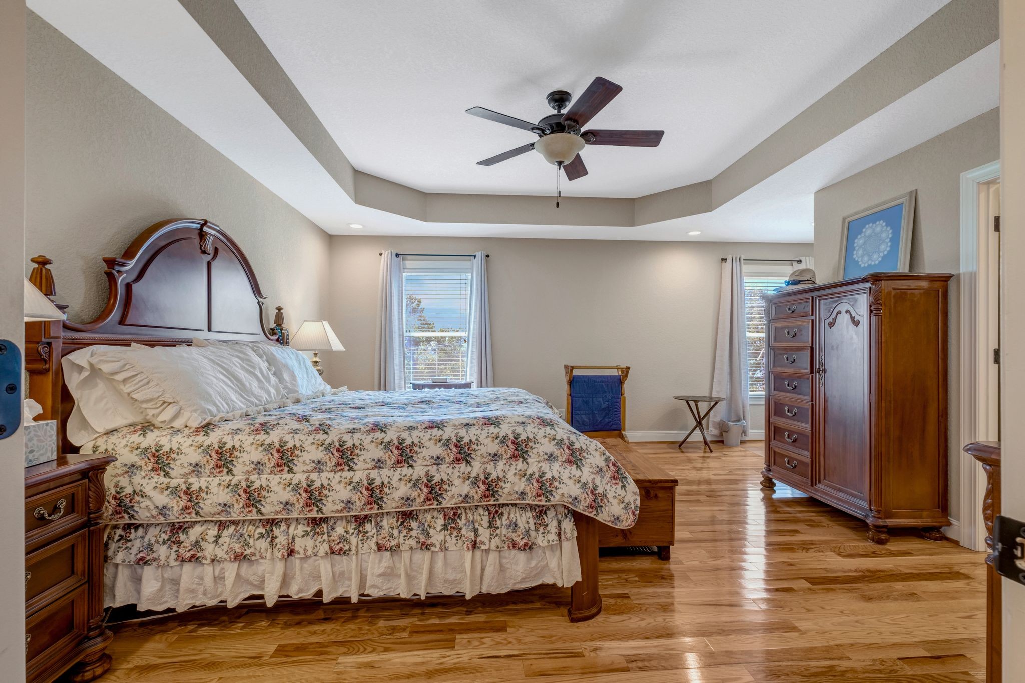 200 Hickory Ridge Lane Hartsville, TN 37074 - Photo 16 of 35 a bedroom with a bed and a dresser with wooden floor