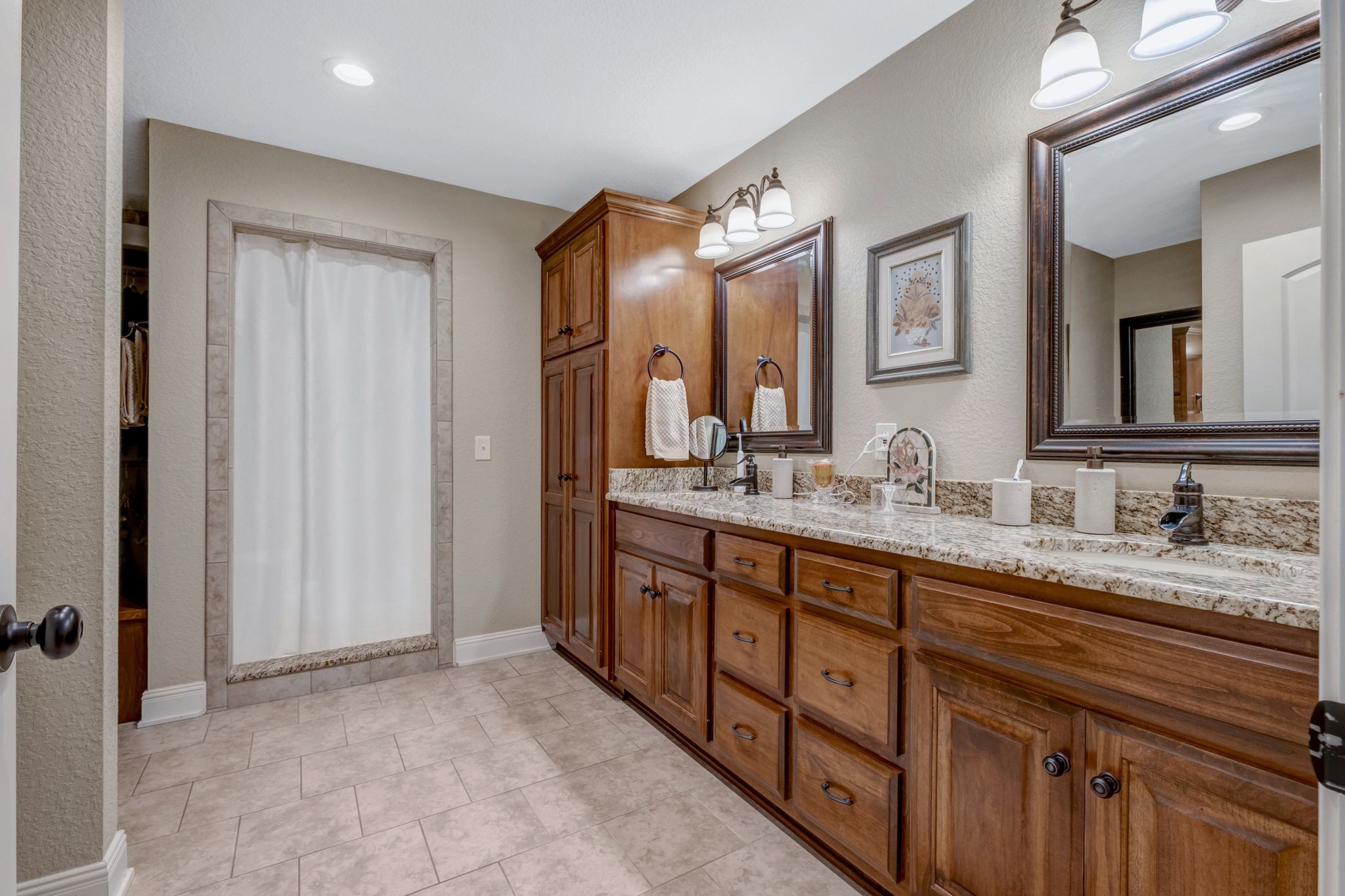 200 Hickory Ridge Lane Hartsville, TN 37074 - Photo 18 of 35 a bathroom with a granite countertop double vanity sink and a mirror
