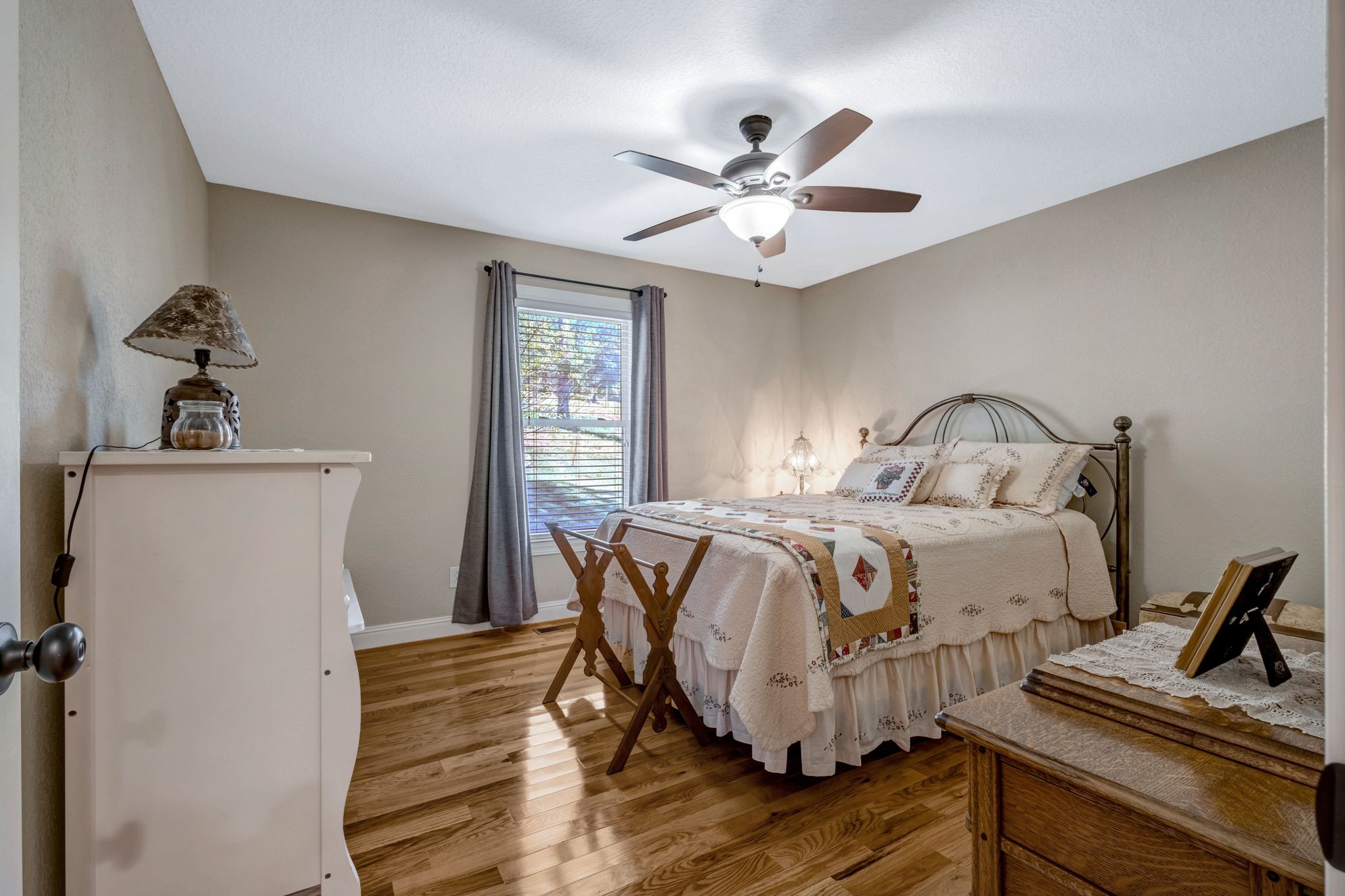 200 Hickory Ridge Lane Hartsville, TN 37074 - Photo 22 of 35 a bedroom with a bed and wooden floor