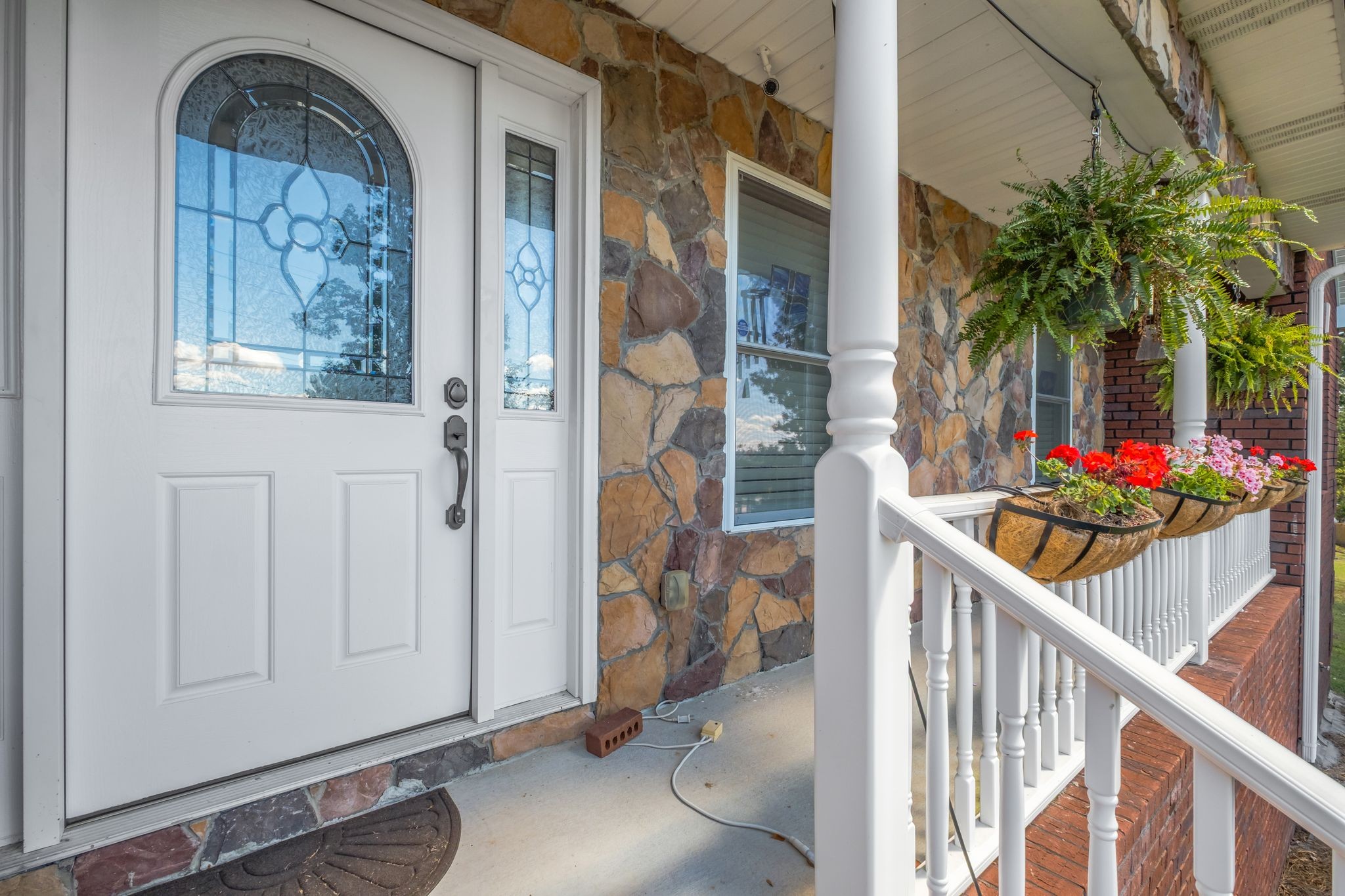 200 Hickory Ridge Lane Hartsville, TN 37074 - Photo 6 of 35 a view of entryway with flower pots