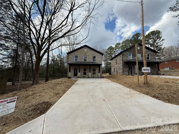a view of front door with wooden floor