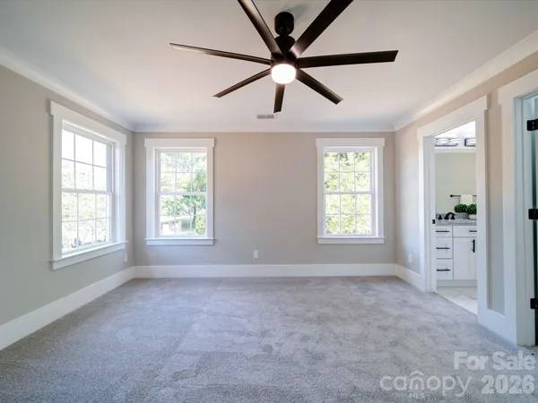 a view of livingroom with window and ceiling fan