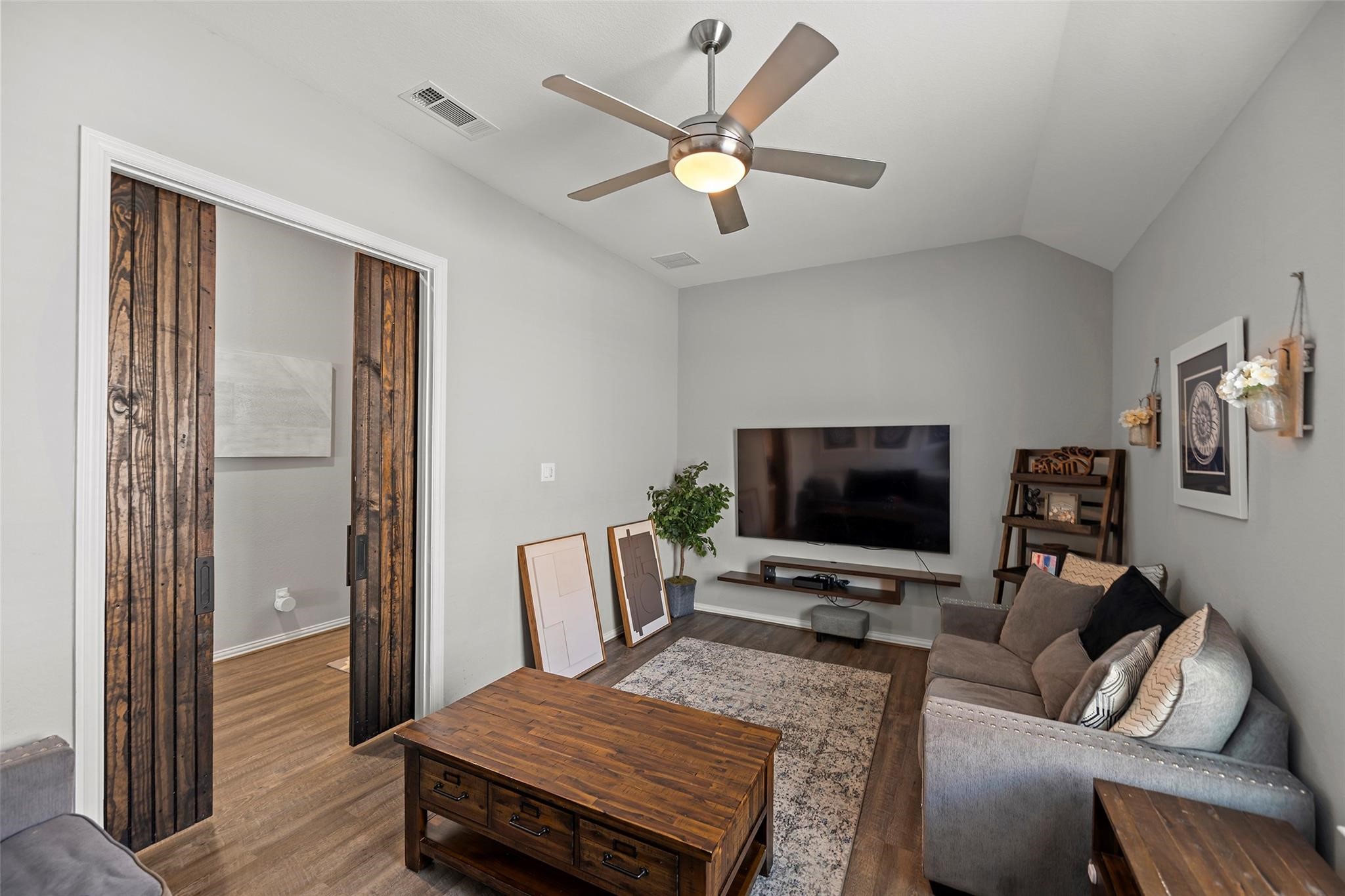 710 Suncatcher Circle Richmond, TX 77406 - Photo 6 of 29 Media room beautiful barn doors