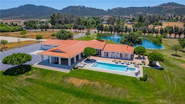 swimming pool view with a outdoor space