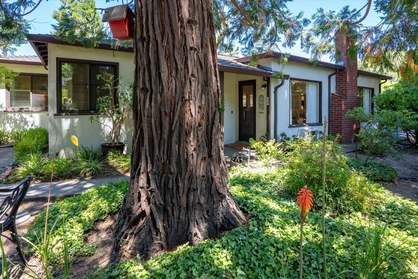16899 Kennedy Road Los Gatos, CA 95032 - Photo 26 of 61 a front view of a house with a yard