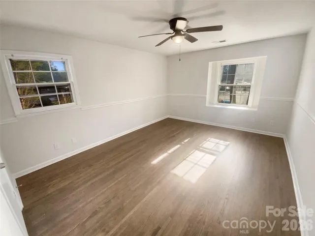 a bathroom with a double vanity sink a and mirror