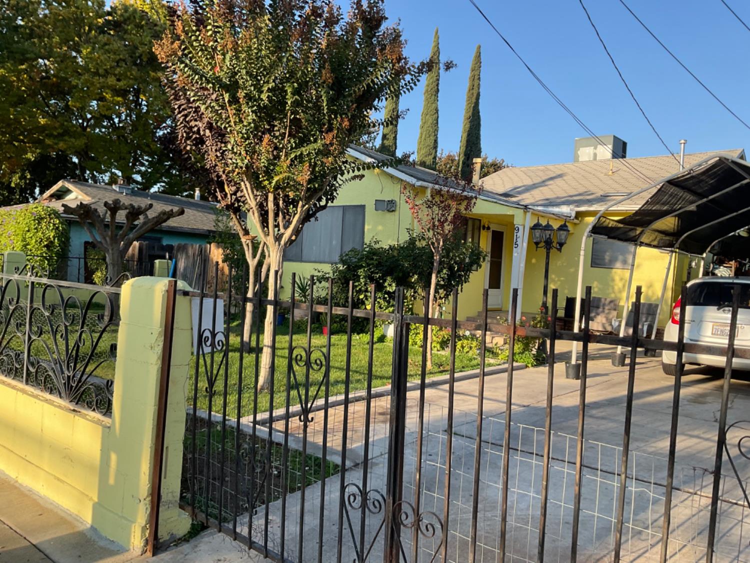 915 R Street Merced, CA 95341 - Photo 20 of 44 a view of a building with a tree