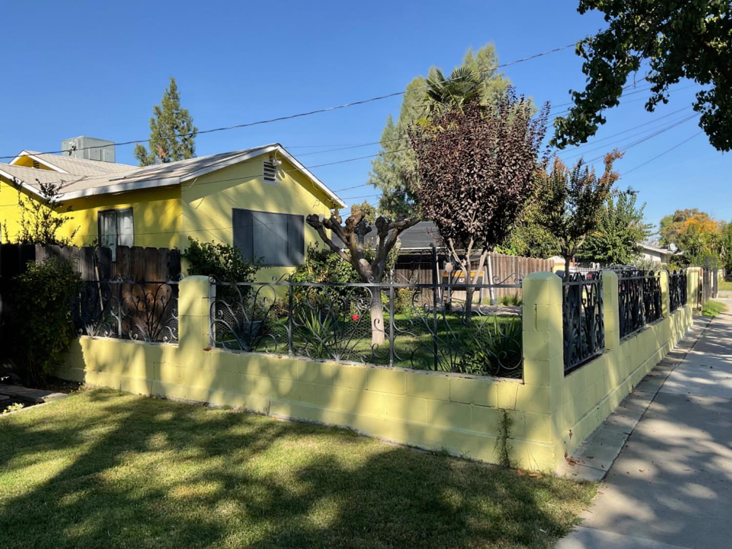 915 R Street Merced, CA 95341 - Photo 2 of 44 a view of a house with swimming pool